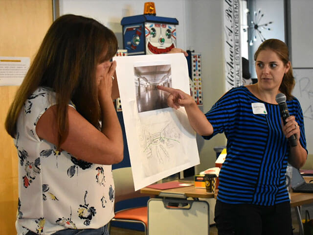 A woman giving a presentation