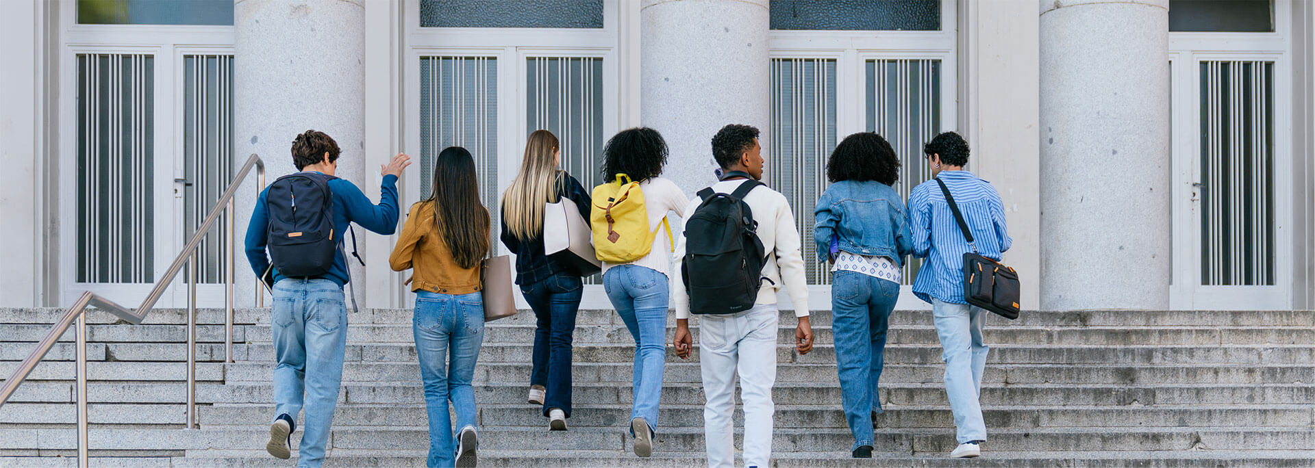 Students walking up the stairs.